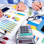 Hand with calculator. Finance and accounting business.