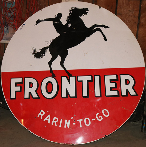 Frontier Gasoline “Rarin’ to Go” porcelain gas station sign from the 1950s brings $5,375 at Holabird’s seven-day auction